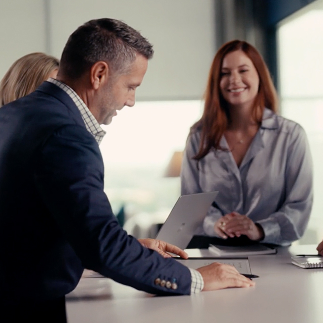 An Accelerate team member walking a broker through a land acquisition deal