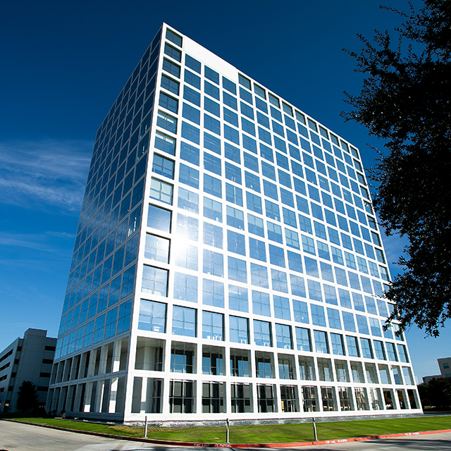 A tall building with blue windows